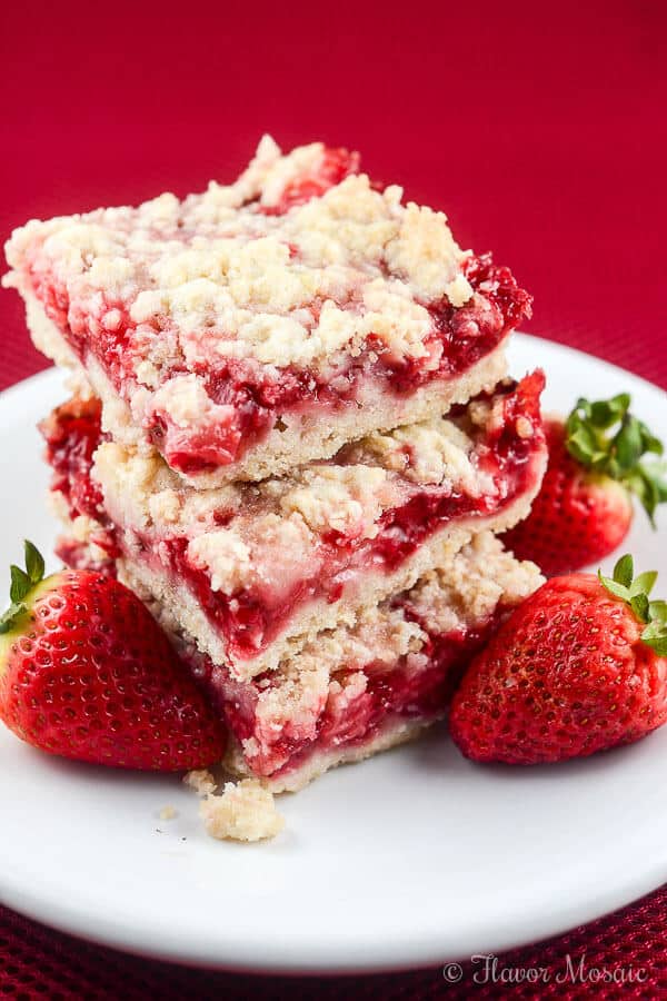 These easy Strawberry Crumb Bars, with a buttery crust, sweet fresh strawberry filling, and crunchy butter crumb topping make wonderful dessert bars to take to a summer party, picnic, or potluck.