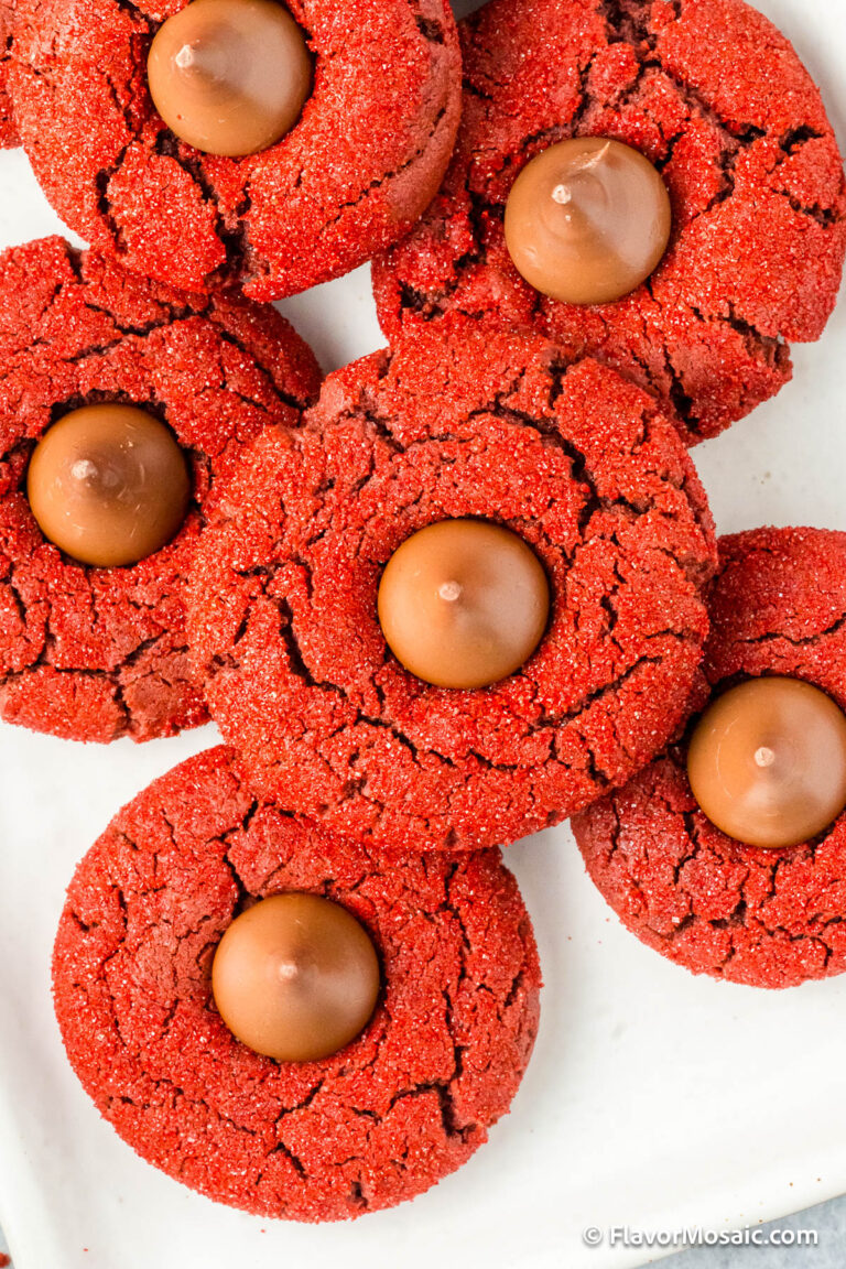 Overhead view of Red Velvet Blossom Cookies on a white platter.