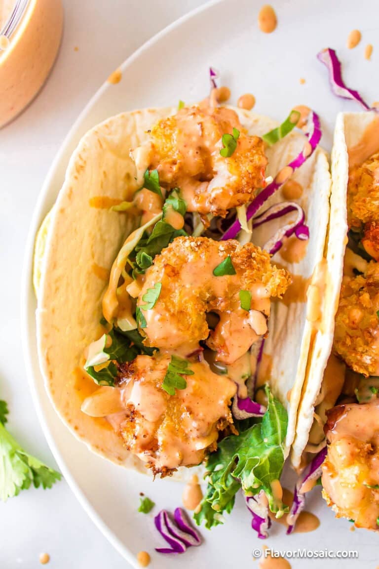 air fryer bang bang shrimp taco on a white plate